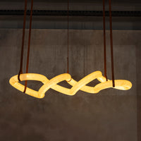Large white marble pendant light with brown leather straps